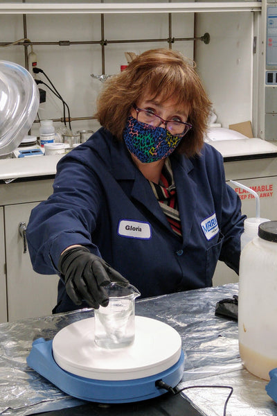 Gloria working in the lab at LA-CO Industries