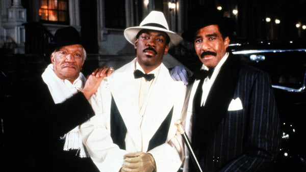 Eddie Murphy dressed as gangster in Harlem Nights 