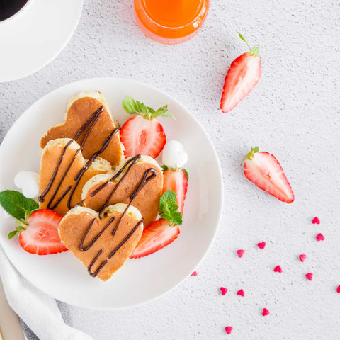 creative display of strawberries and pancakes