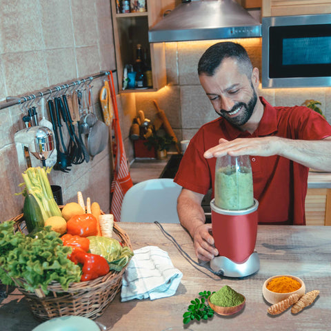 dad making a smoothie with veggie powder