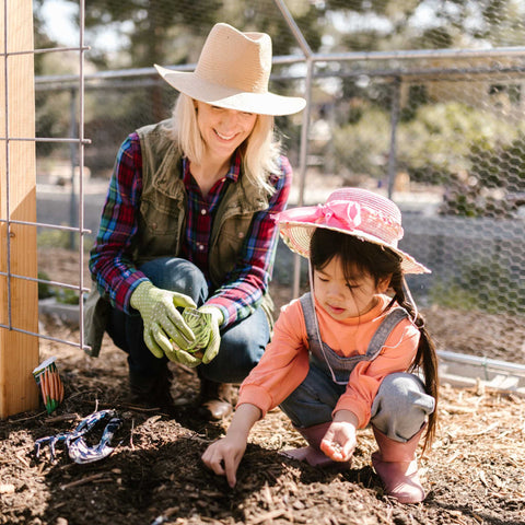 teaching child about planting seeds