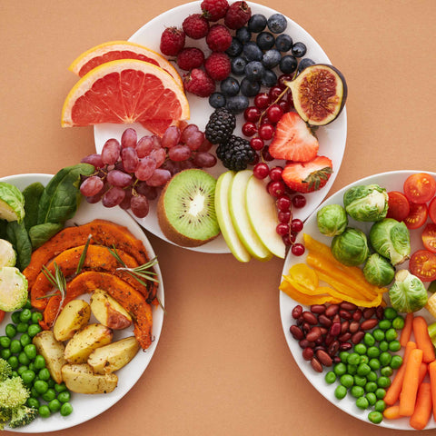 plates of fruits and vegetables