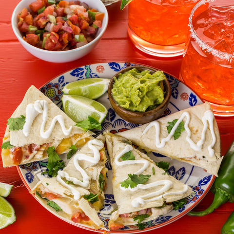 cheese and veggie quesadilla on a plate