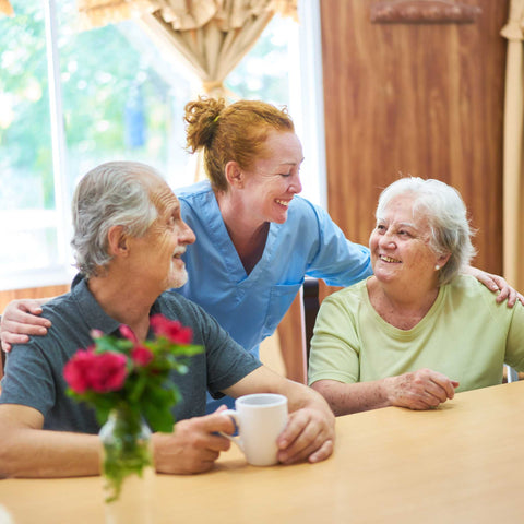 elderly parents with caregiver