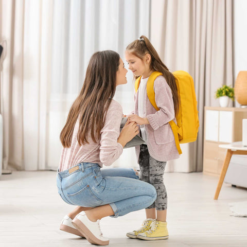 mom sending child off to school