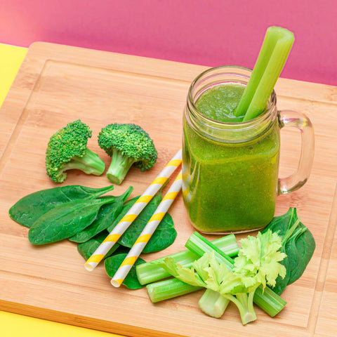 green smoothie with broccoli, spinach, and celery