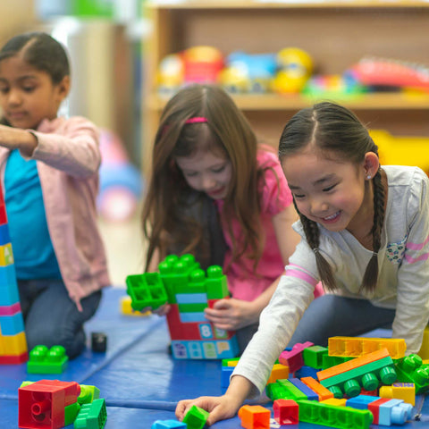 kids playing with lego blocks