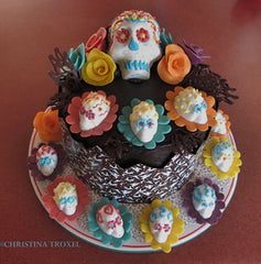 muertos cake with sugar skulls