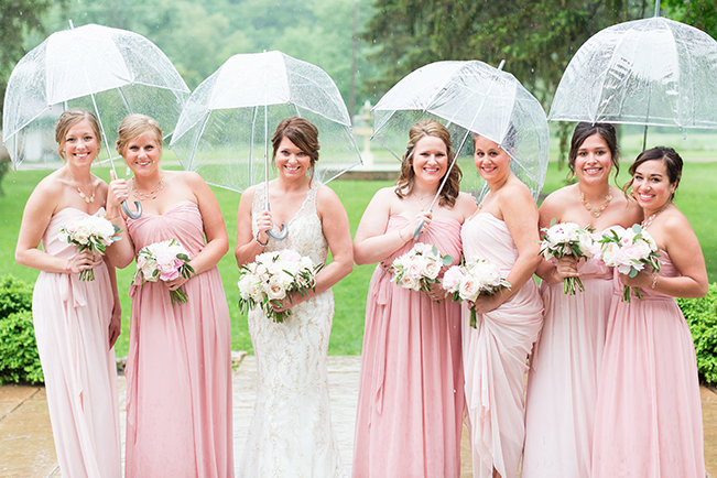 bridesmaids with umbrellas