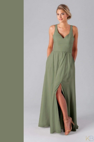 Model wearing Kennedy Blue Bridesmaid Dress "Riley" in color 'Moss Green'.