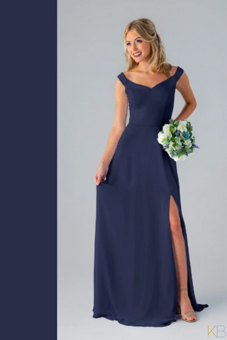 Model in Kennedy Blue Bridesmaid Dress "Haley" in color 'Navy Blue'.