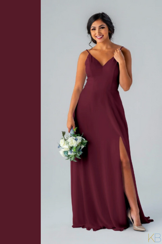 Model wearing Kennedy Blue Bridesmaid Dress "Sophie" in color 'Bordeaux'.