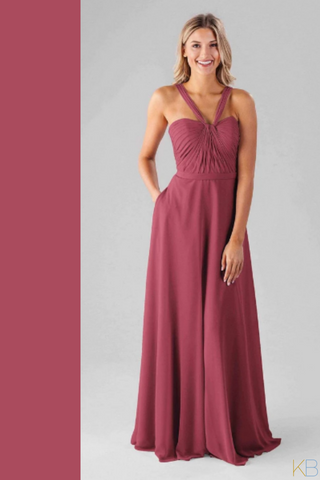 Model wearing Kennedy Blue Bridesmaid Dress "Ivy" in color 'Rosewood'.