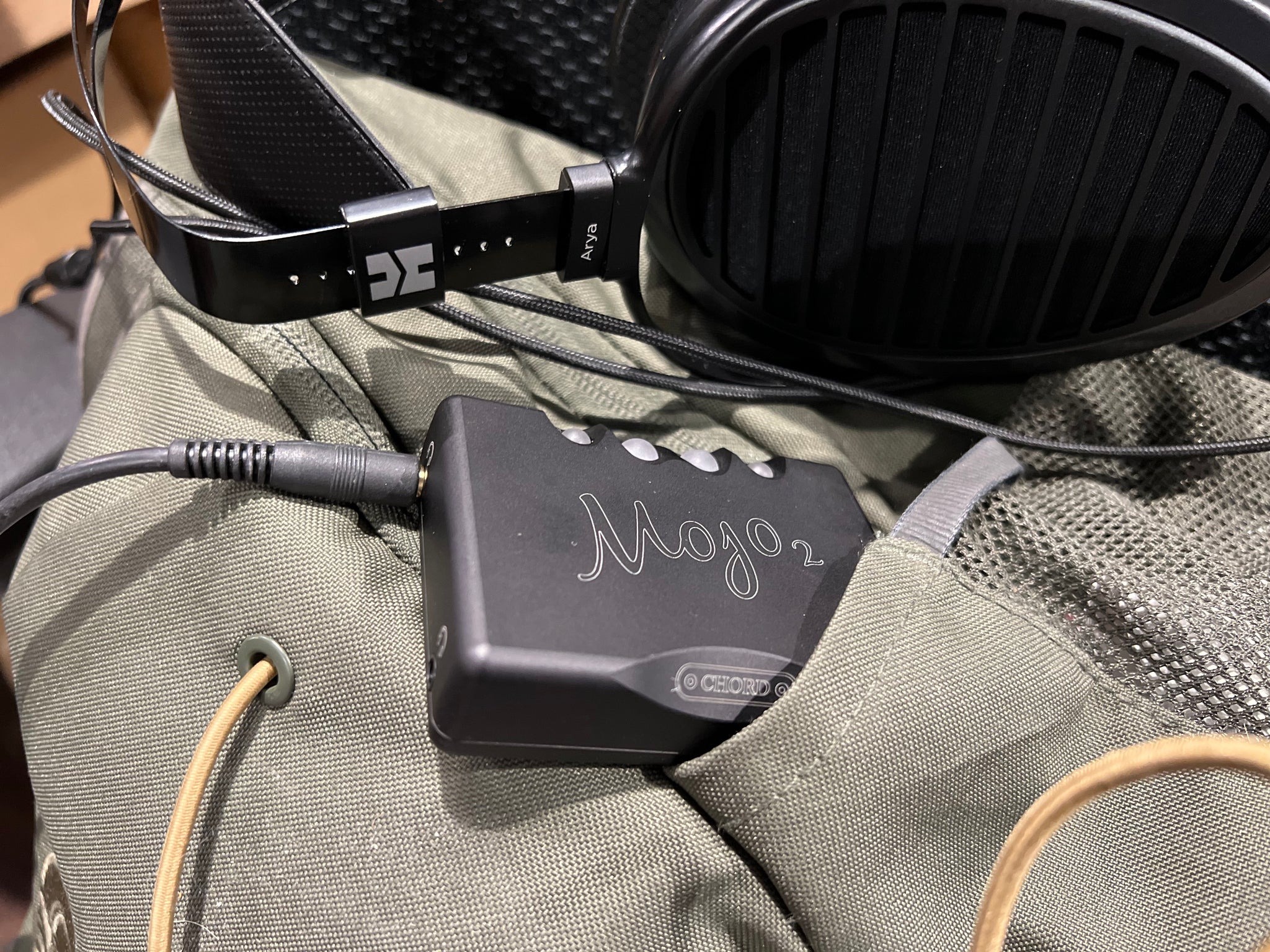 Chord Mojo 2 in canvas bag pocket with HiFiMAN Arya headphones