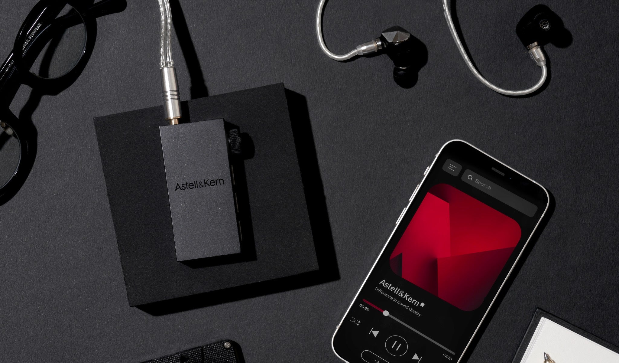 Astell&Kern AK HB1 with connected earphones and Bluetooth-paired iPhone