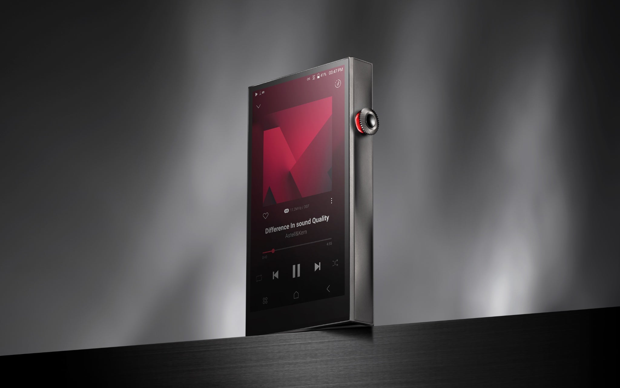 Astell&Kern SE300 Titanium edition dramatic 3 quarter front over gray shadowy background