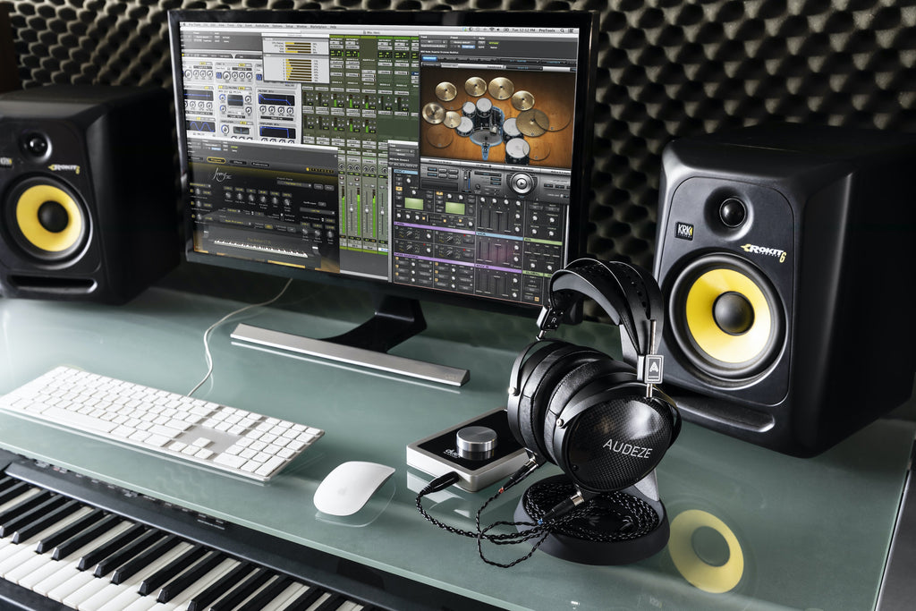 Audeze LCD-XC in studio with piano, monitor and speakers