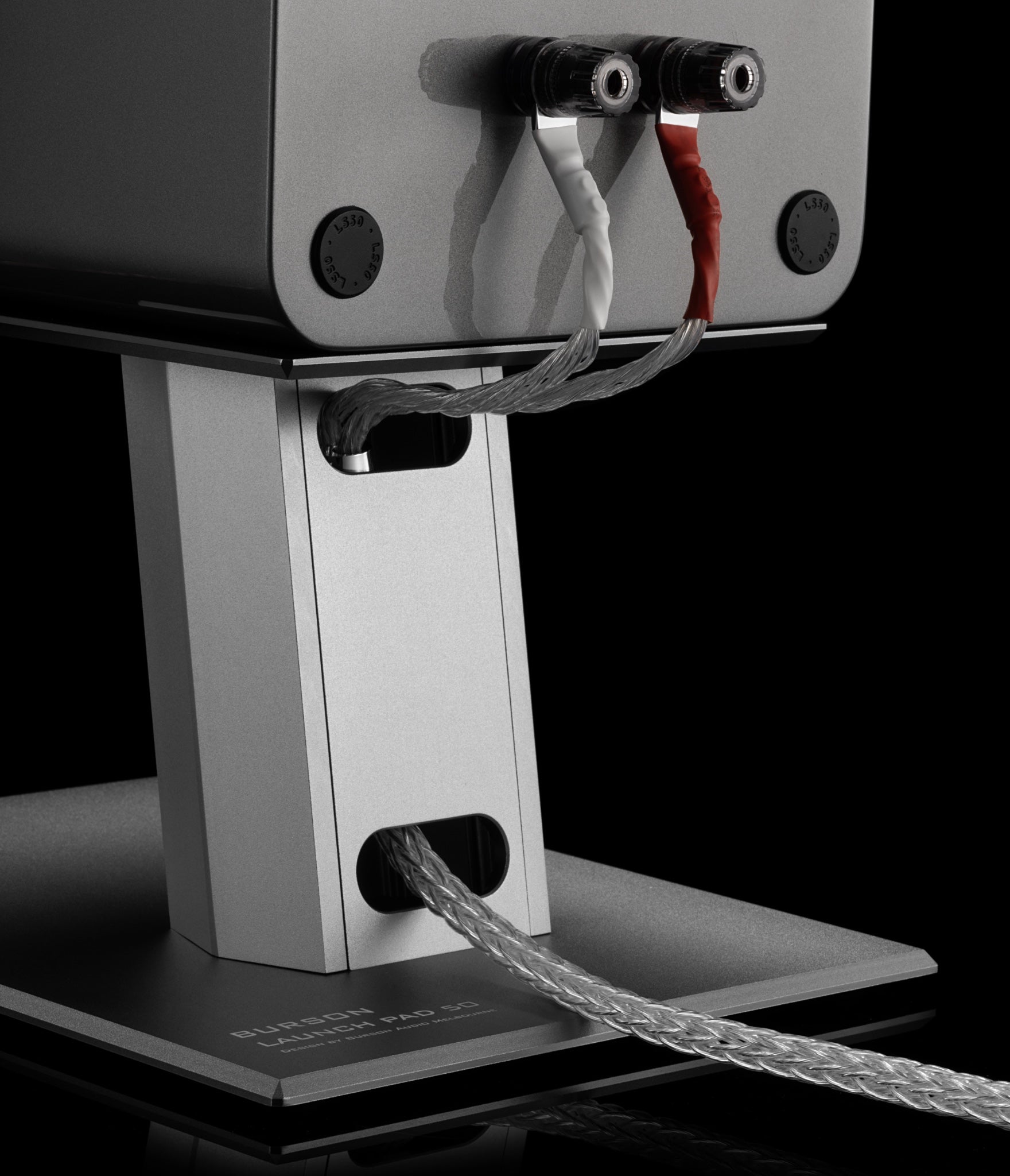 Burson Launch Pad 50 stand with speaker and attached wires highlighting cable management
