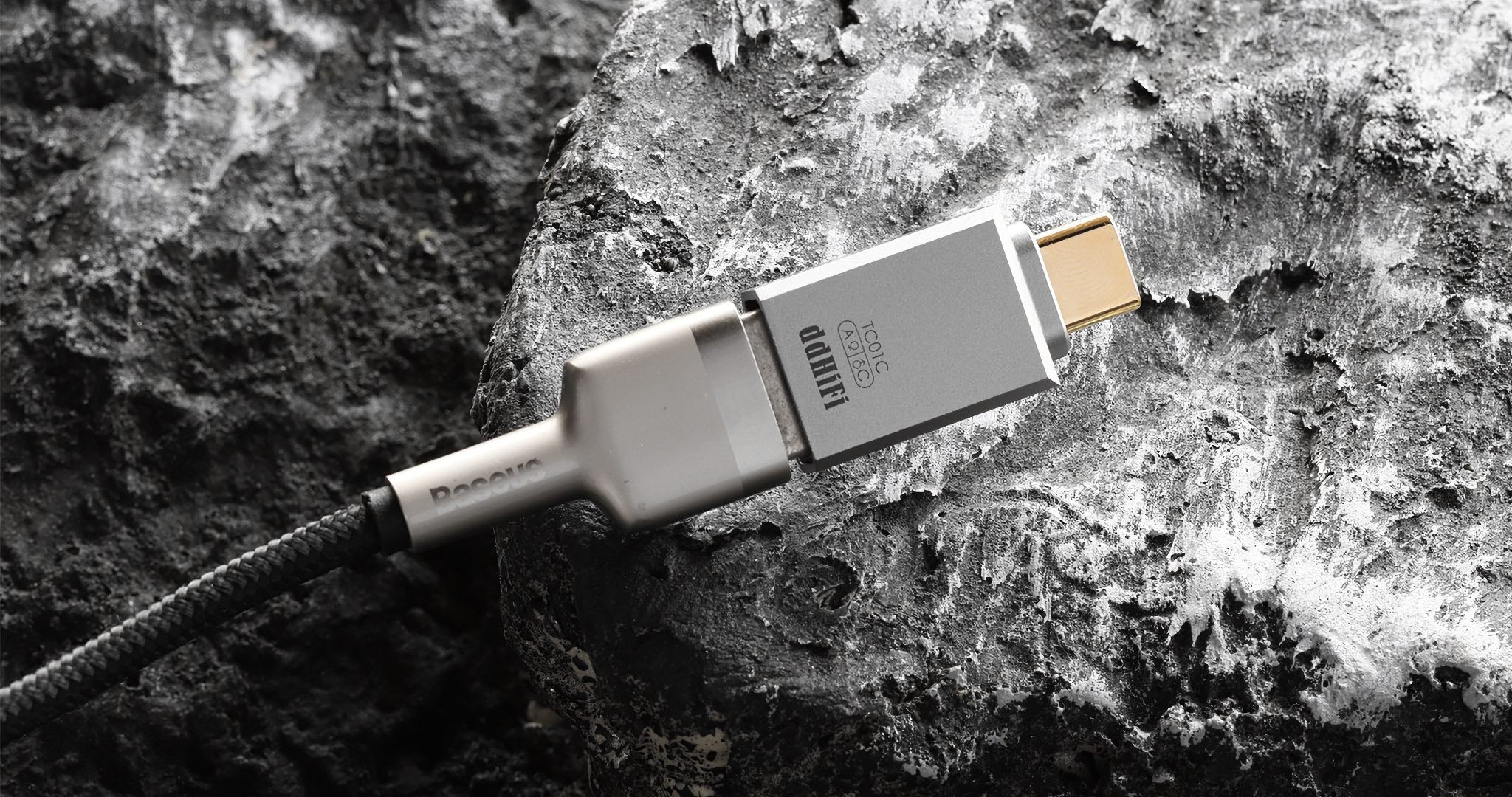 ddHiFi TC01C with attached USB-A cable over textured, marble background