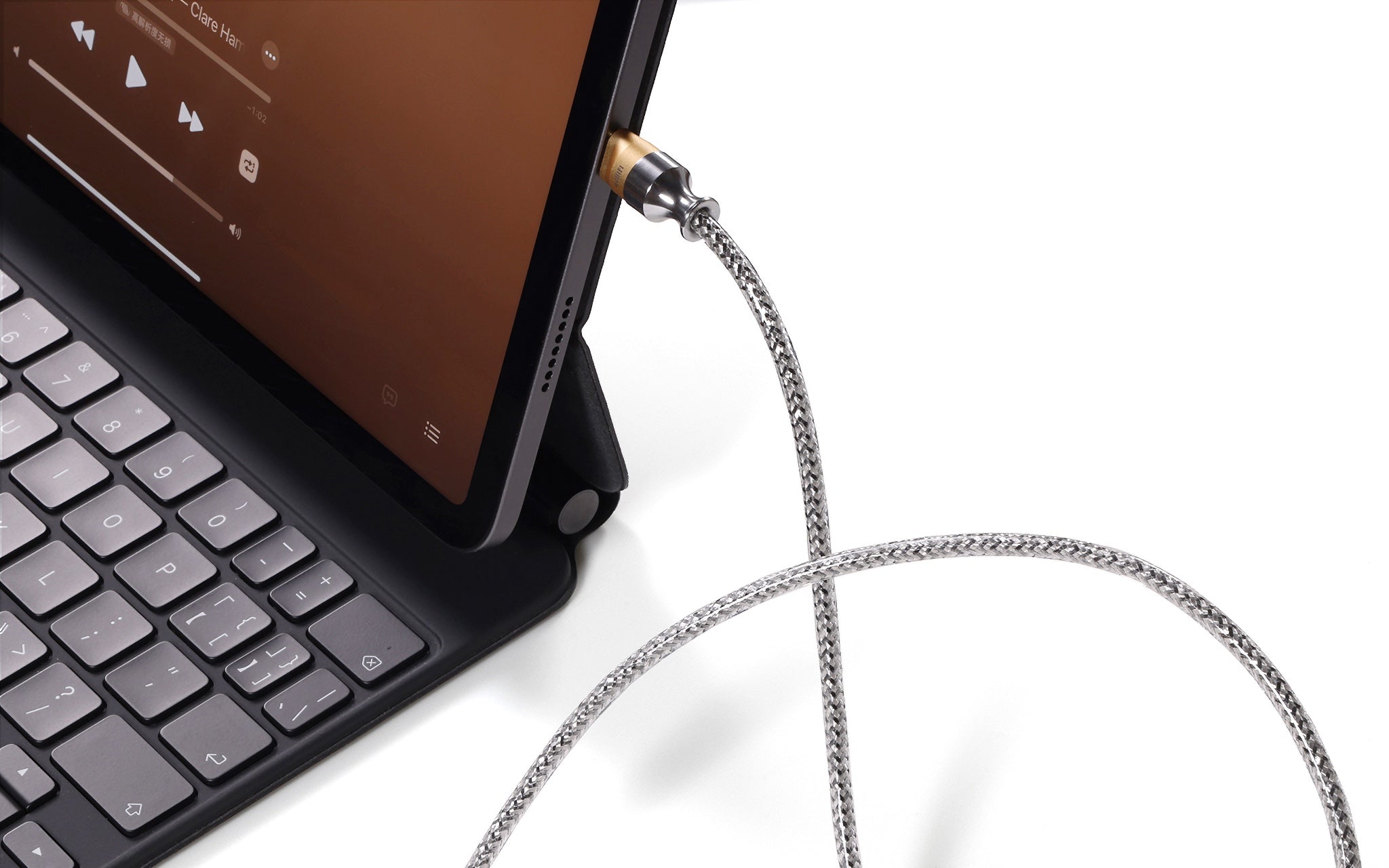 ddHiFi TC07S cable attached to iPad with keyboard highlighting silver shielding