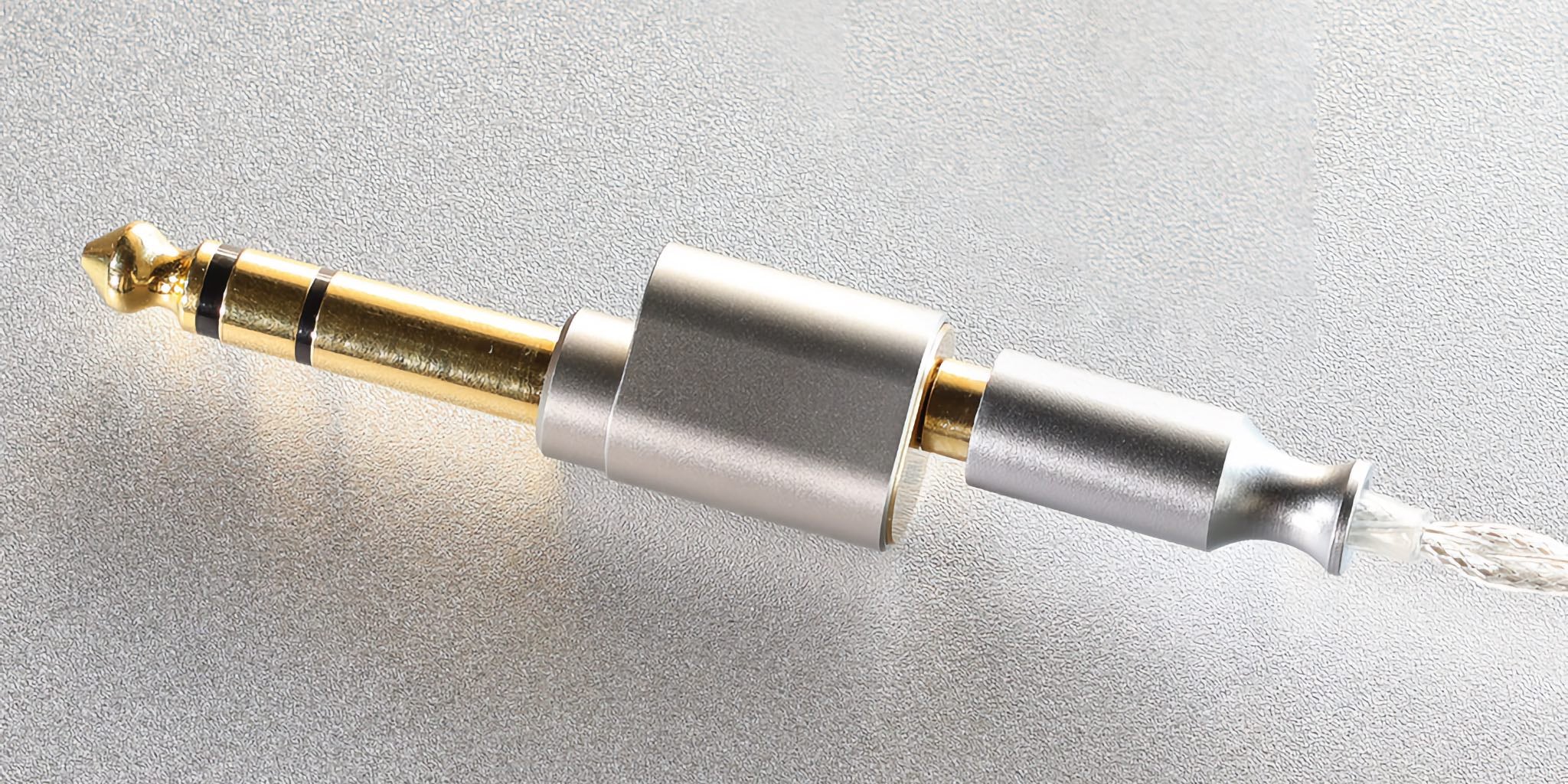 ddHiFi DJ65A(AL) profile closeup with inserted 3.5mm cable