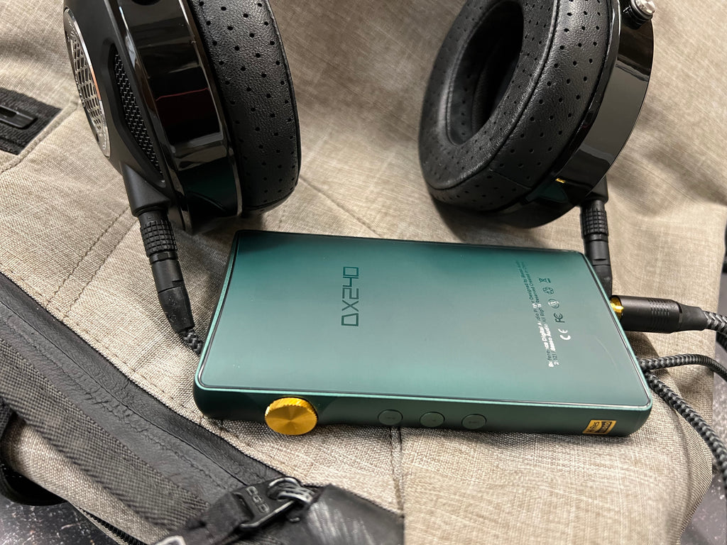 iBasso DX240 green with connected Focal Utopia headphones on canvas bag