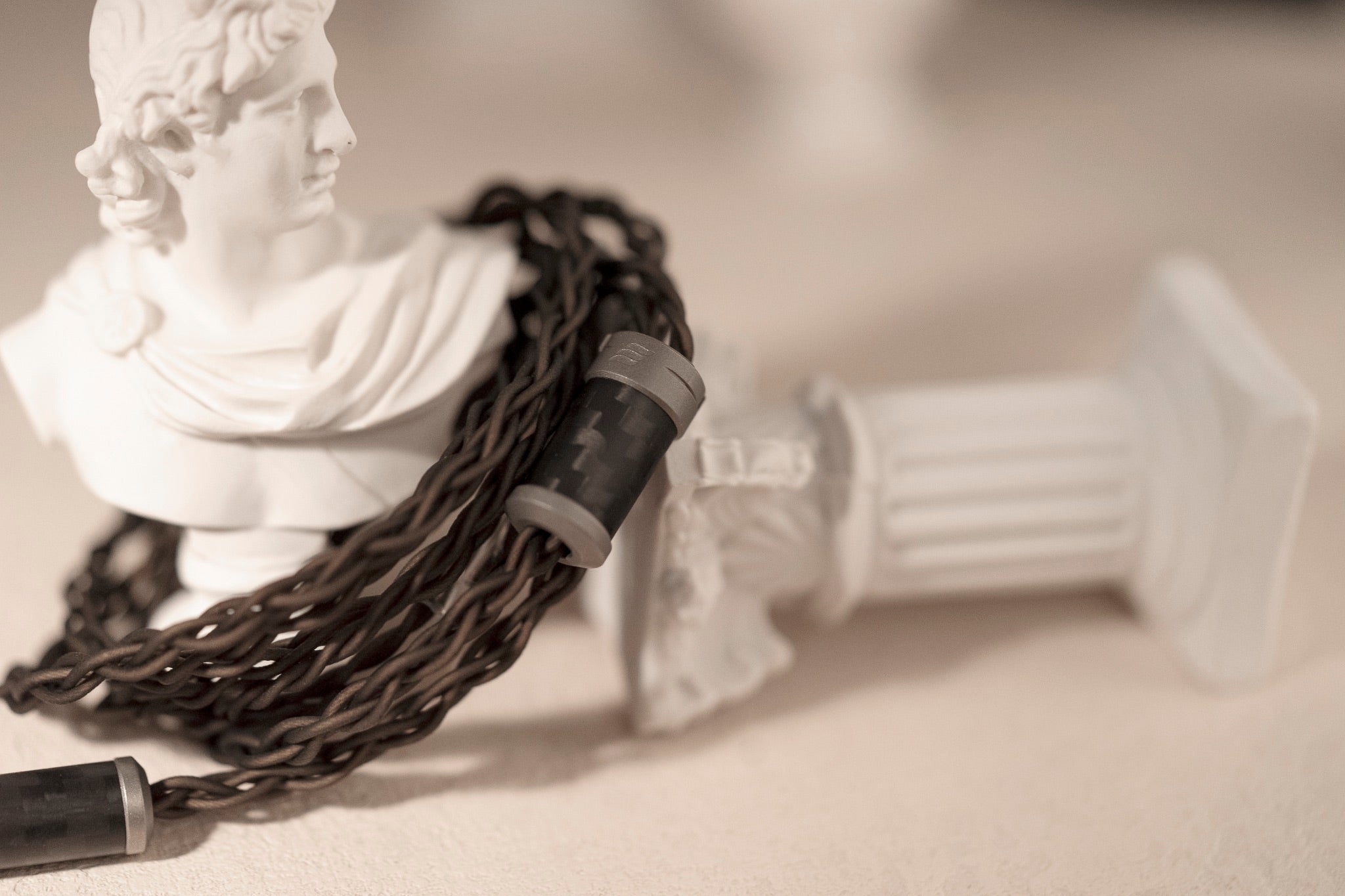 Effect Audio Chiron 4W cable coiled around Greek ceramic statue