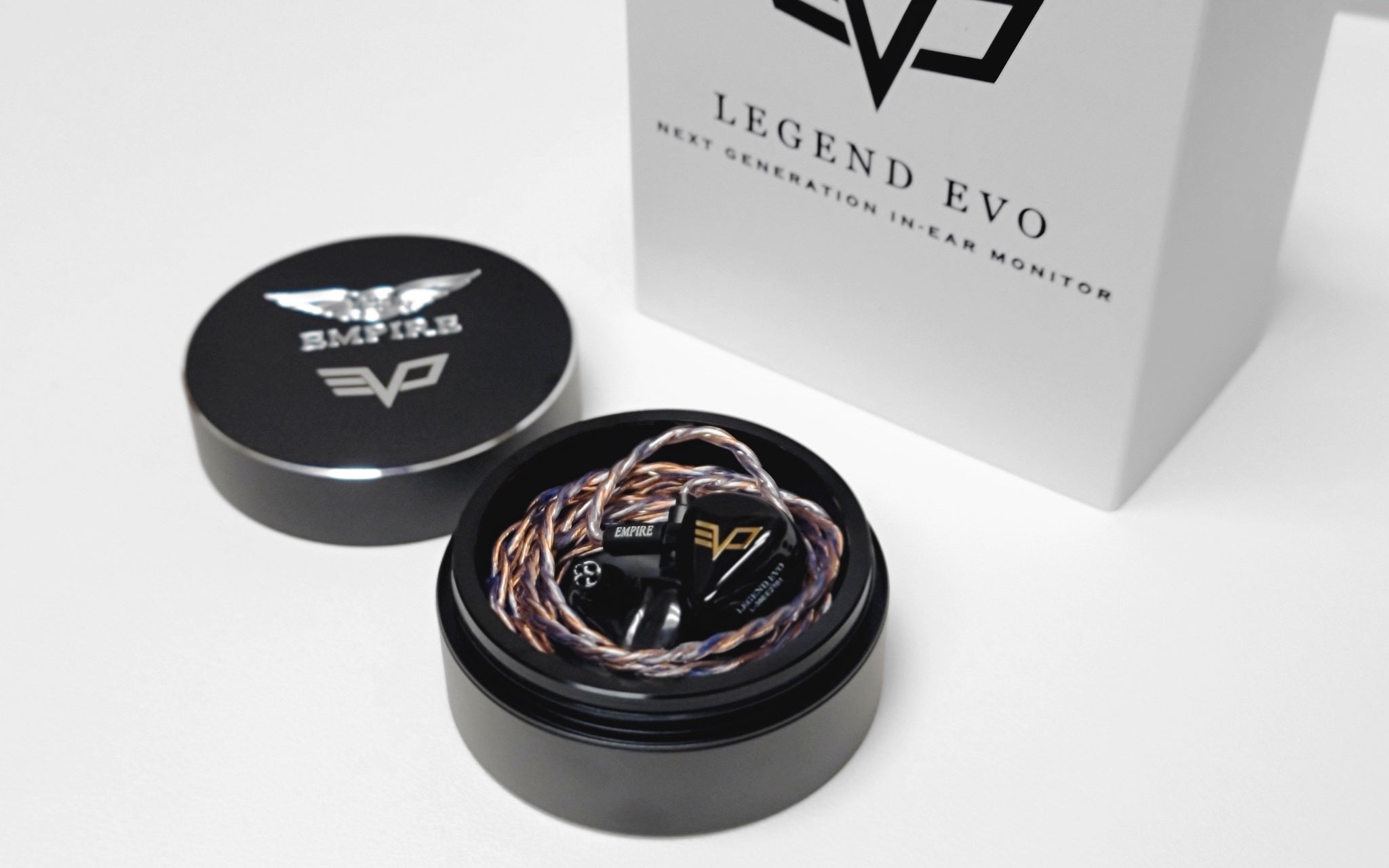 Empire Legend EVO with attached stock cable coiled in black metal case with retail box