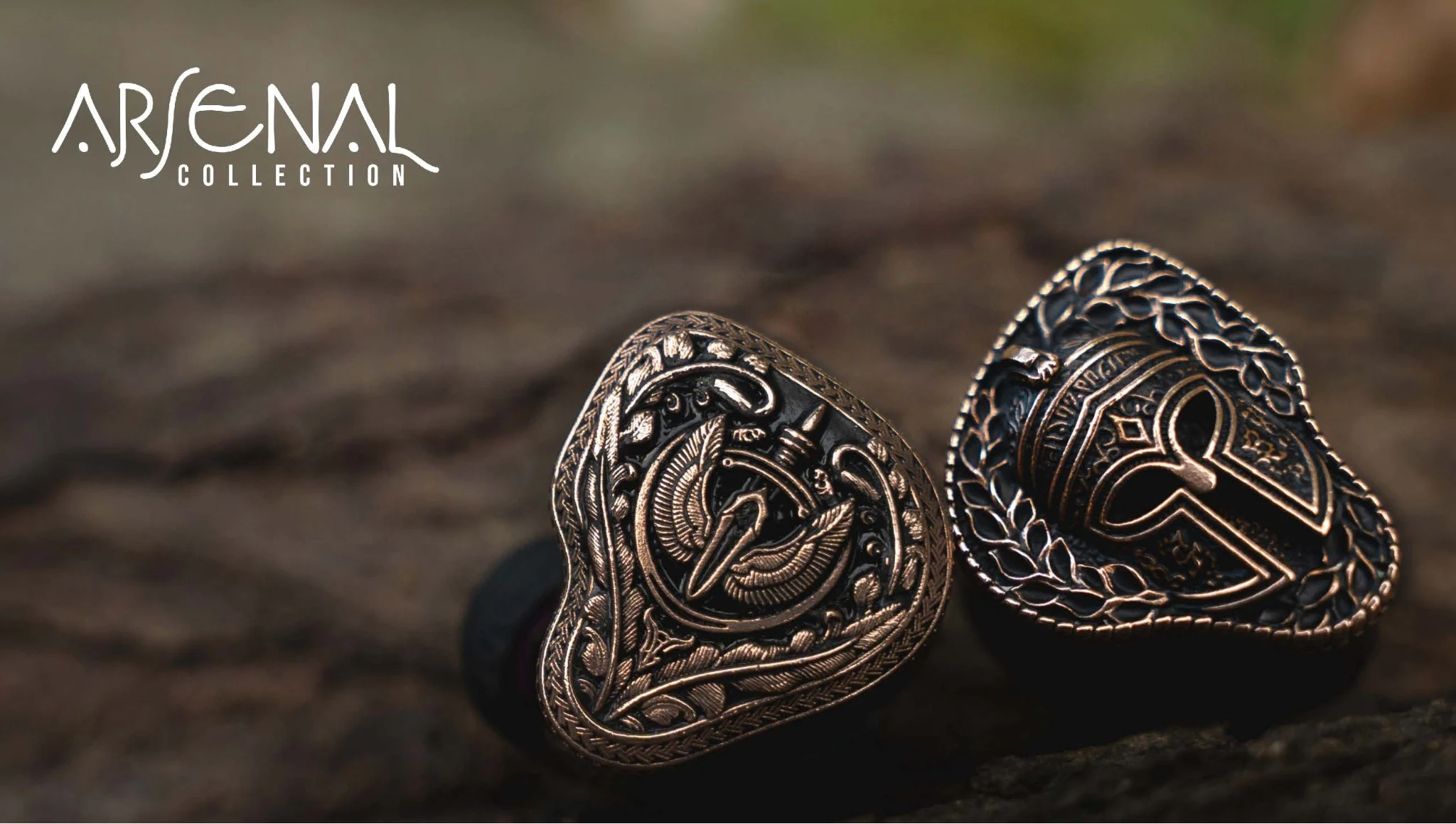 FlipEars Aegis and Legion earphones face forward closeup over rock Bokeh background with Arsenal logo