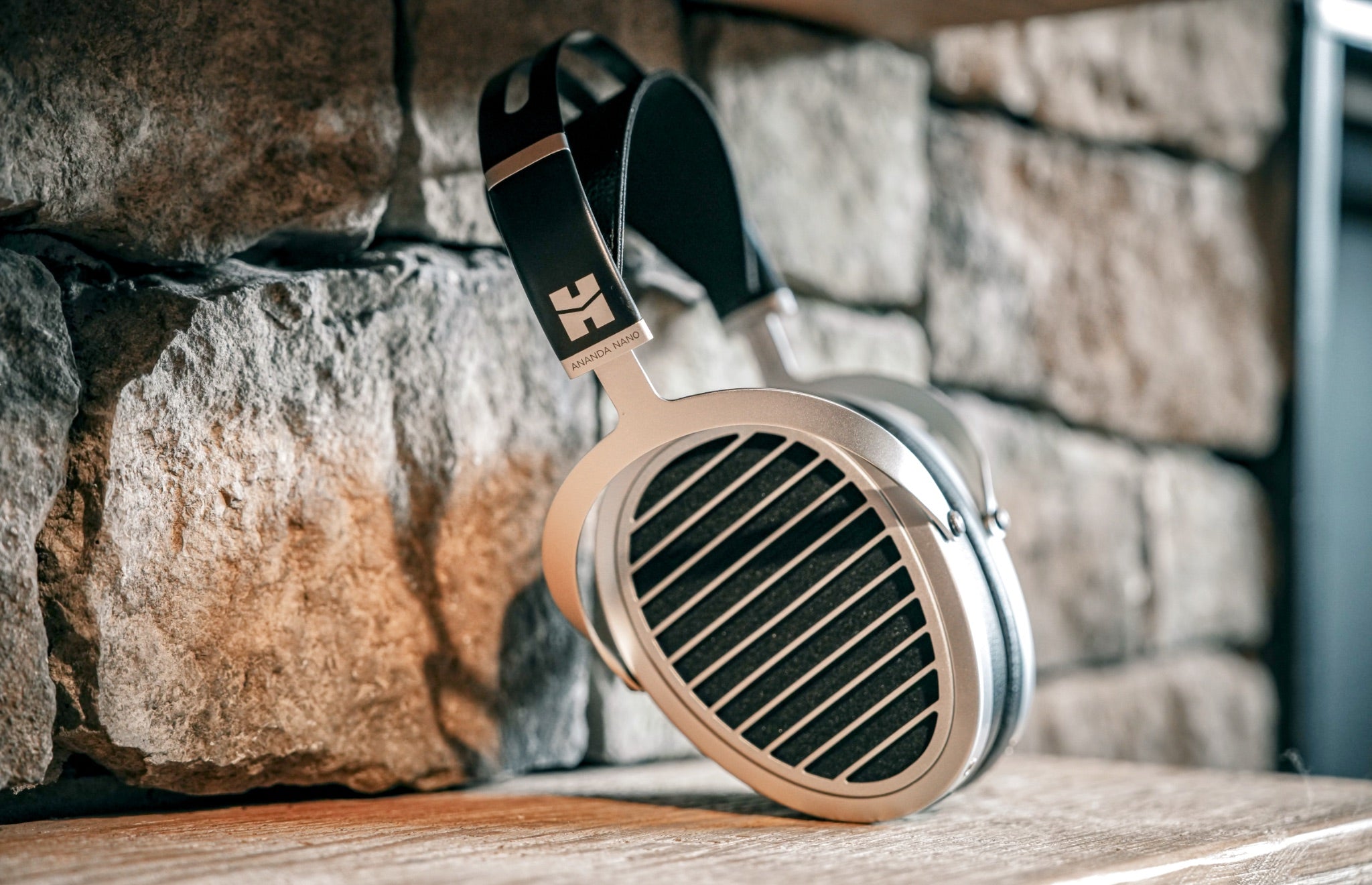 HiFiMAN Ananda Nano headphone leaning against stone wall from Bloom Audio gallery