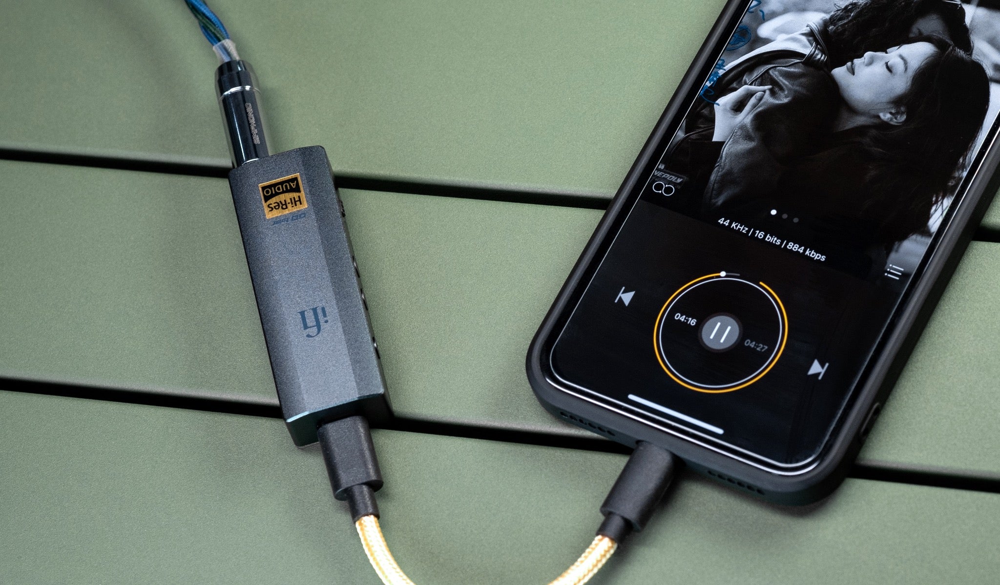 iFi GO bar lifestyle, connected to mobile phone with USB-C cable