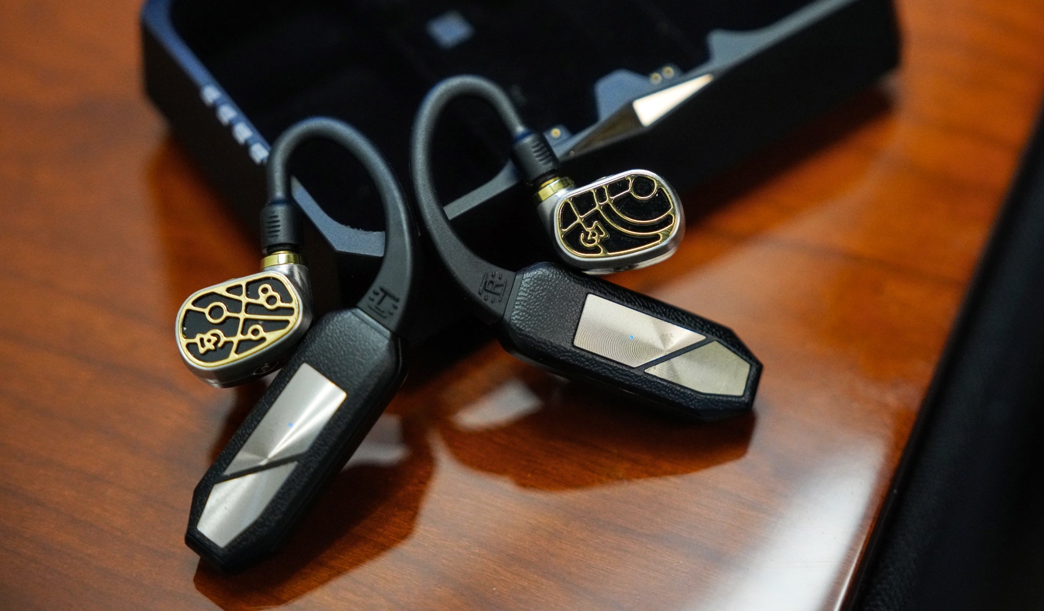 iFi GO Pod with attached Campfire Audio Solaris on wood desk from Bloom Audio gallery