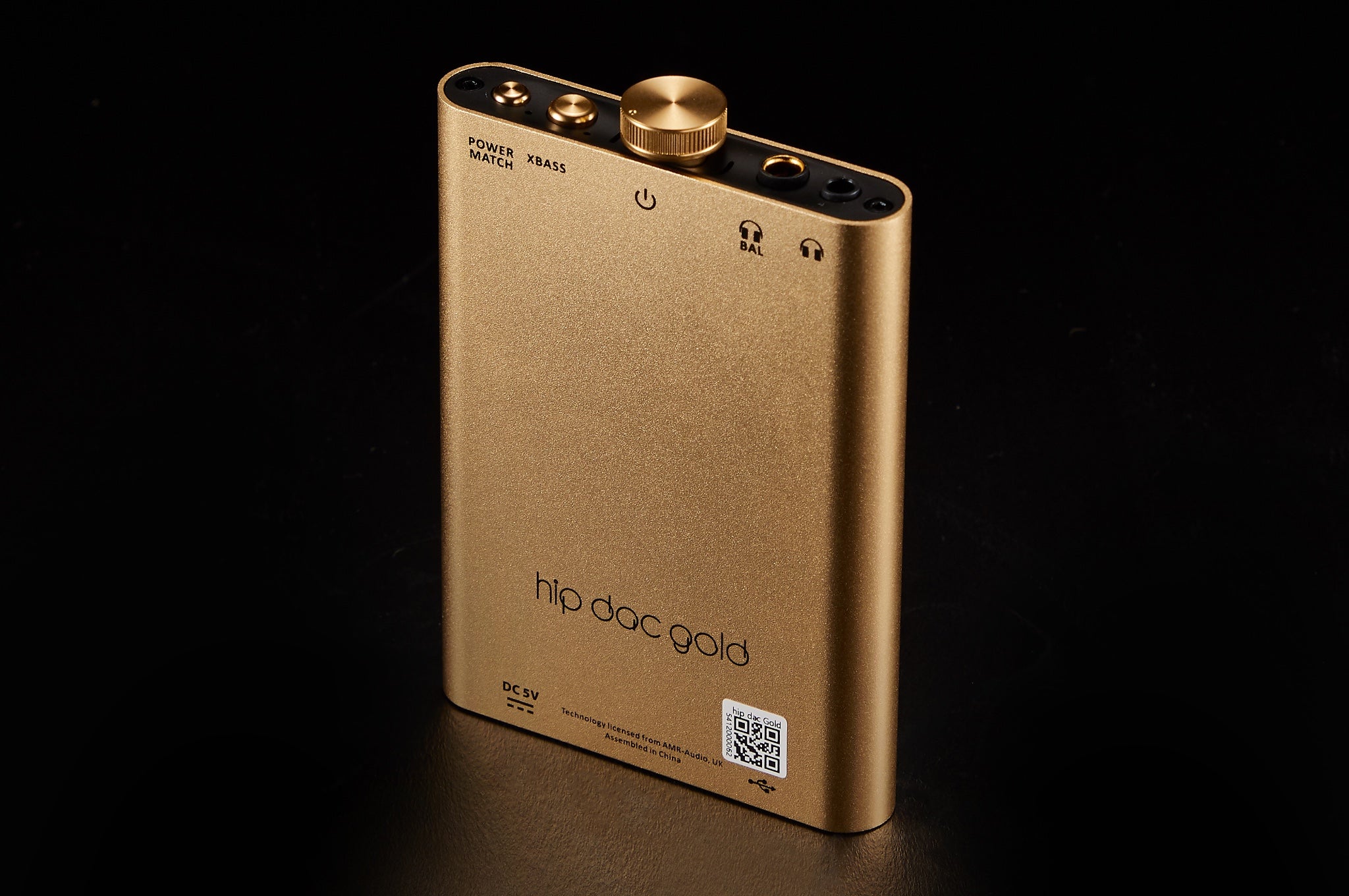 iFi hip-dac 2 gold rear top 3 quarter over black background