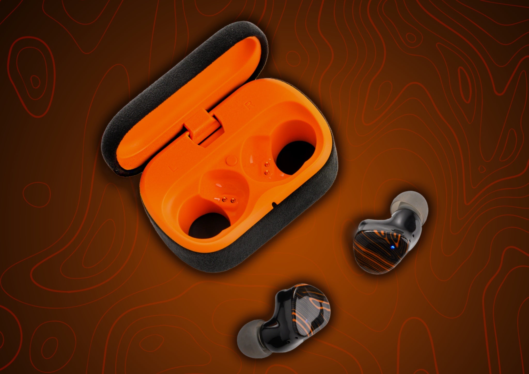 Noble FoKus Triumph open case with earphones bird's eye over orange swirl background