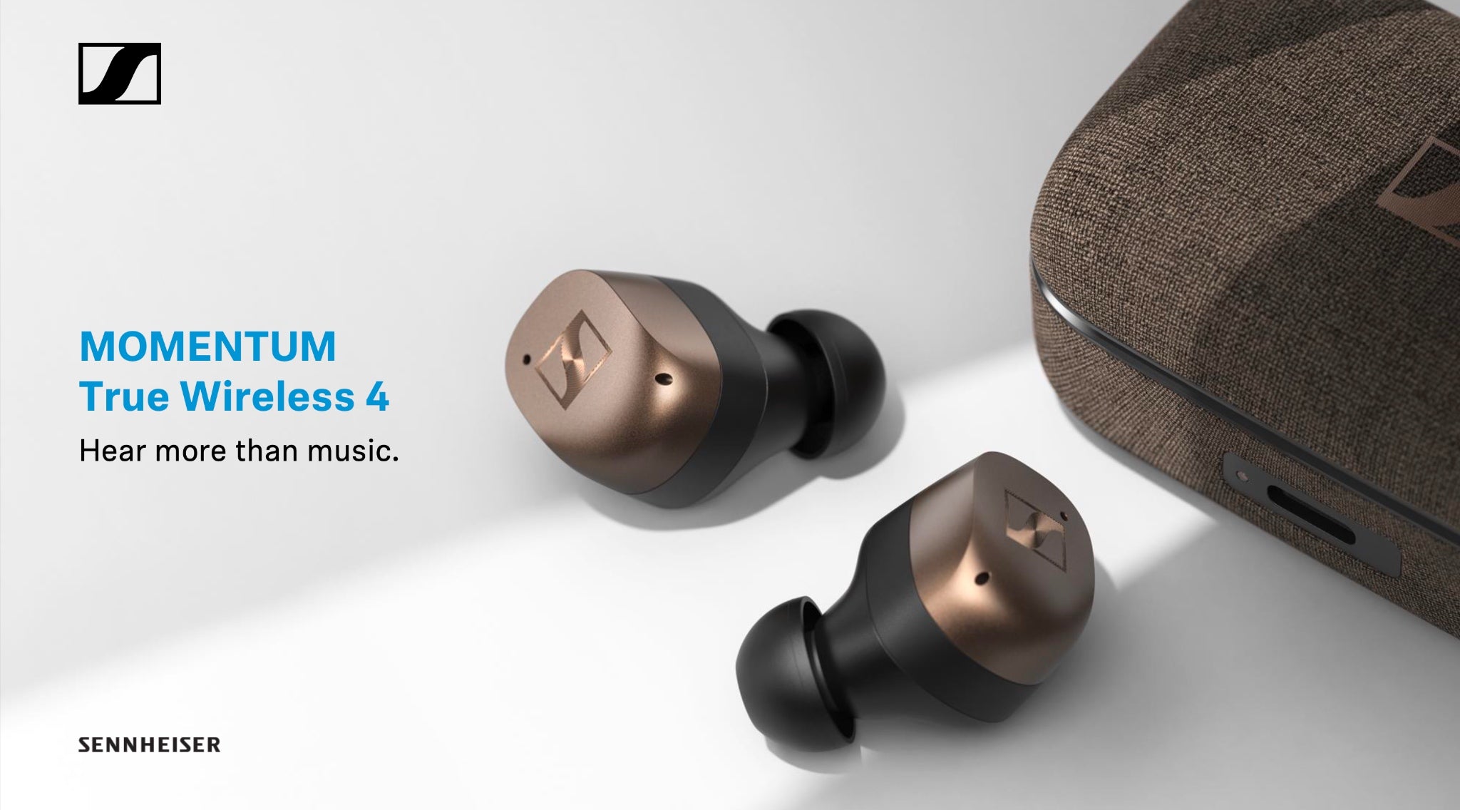 Sennheiser Momentum 4 earphones quarter closeup in black copper with case and brand logo