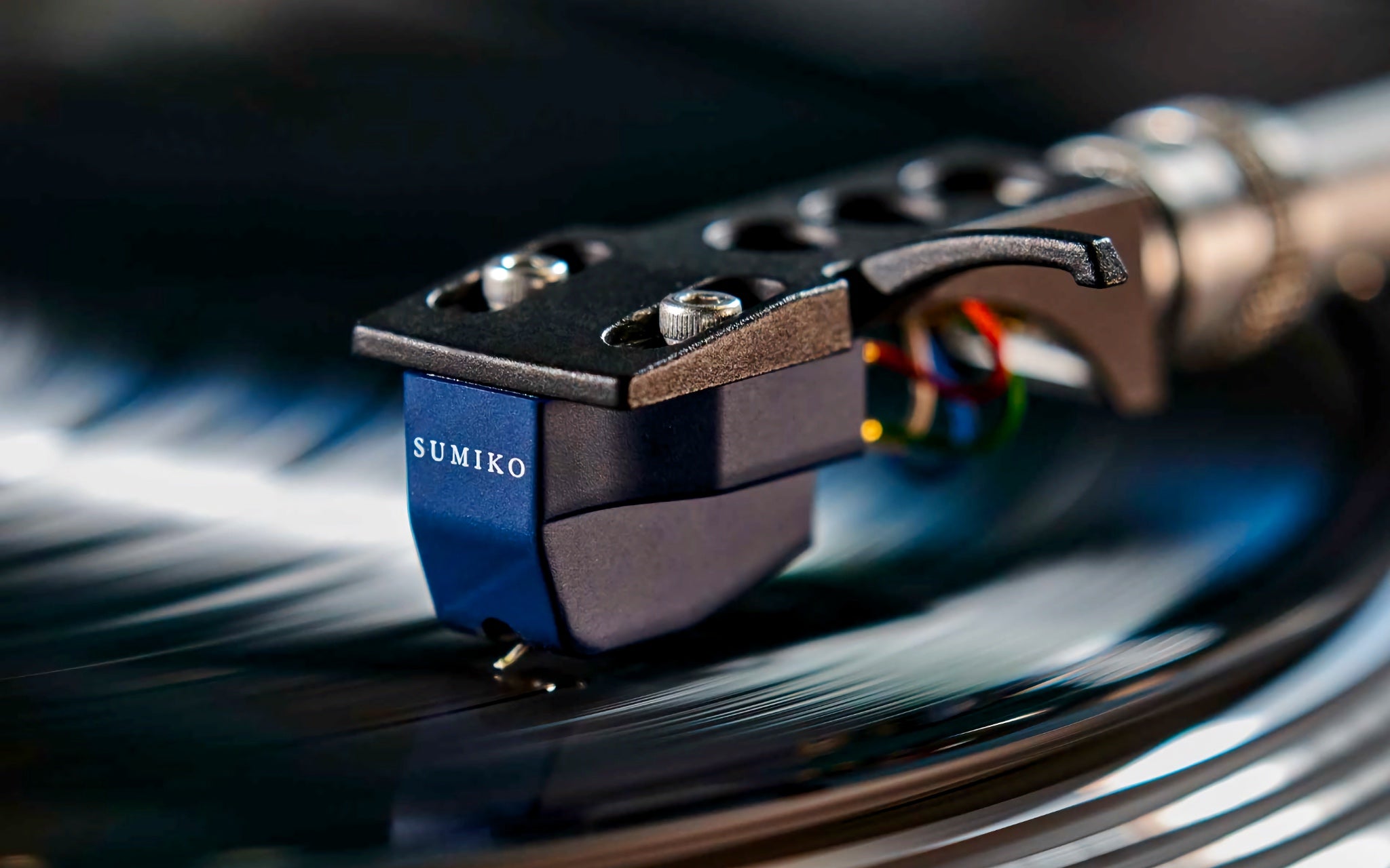 Sumiko Blue Point No. 3 mounted to tonearm over playing record