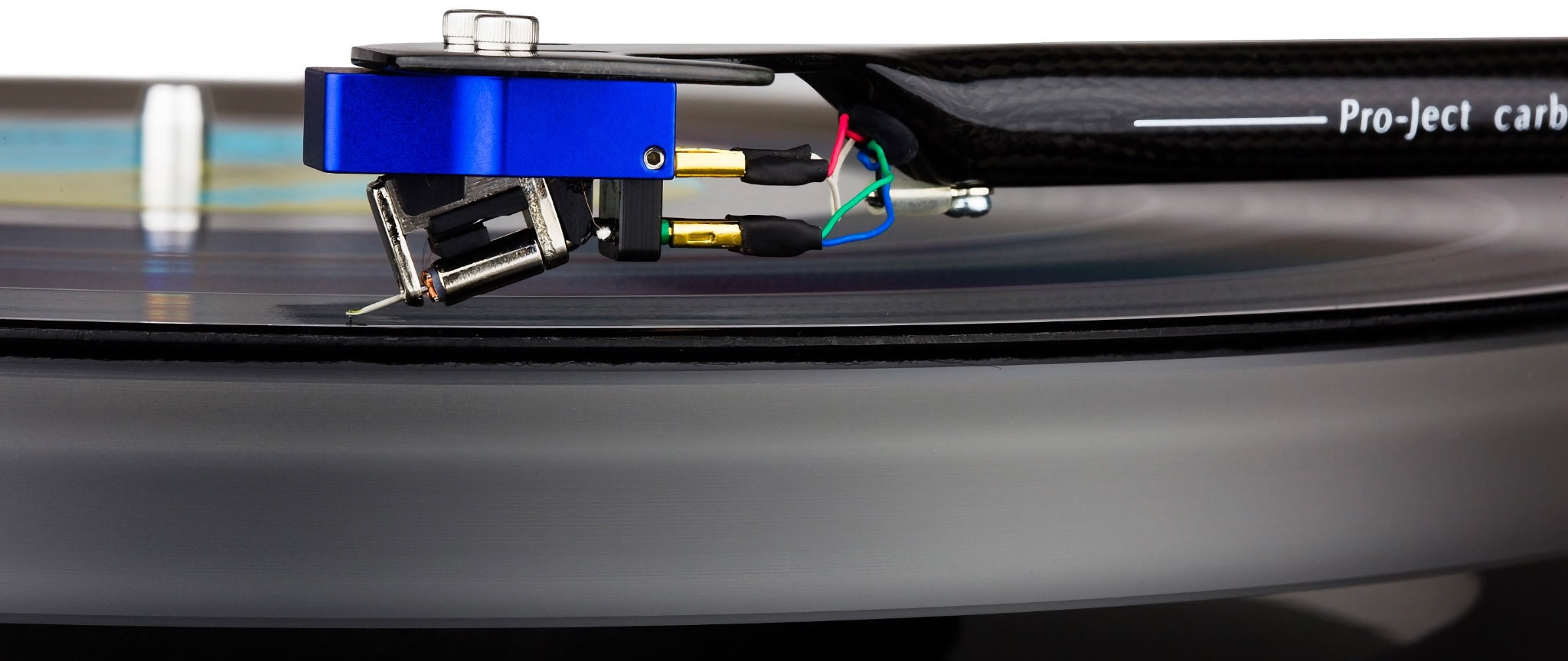 Sumiko Songbird cartridge mounted on Pro-Ject turntable with active vinyl playing