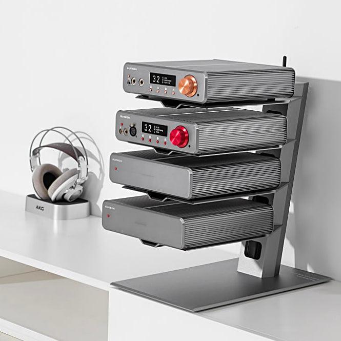 Burson Mothership silver right front quarter with 4 Burson amps on shelves