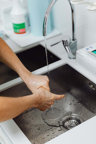 stainless-steel-sink-running-water