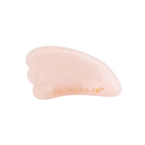 This is an image of Dromen & Co Rose Quartz Gua Sha Stone on www.sublimelife.in