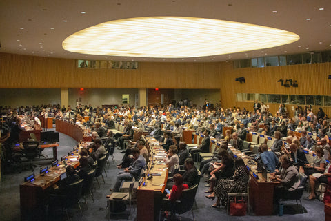 Conference room filled with people.