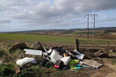 Rubbish dumped in the middle of the countryside. 