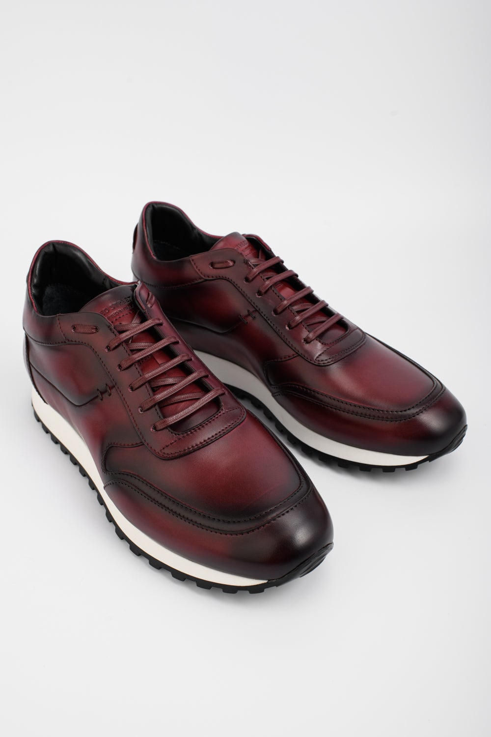 SOHO red-dusk patina runners.