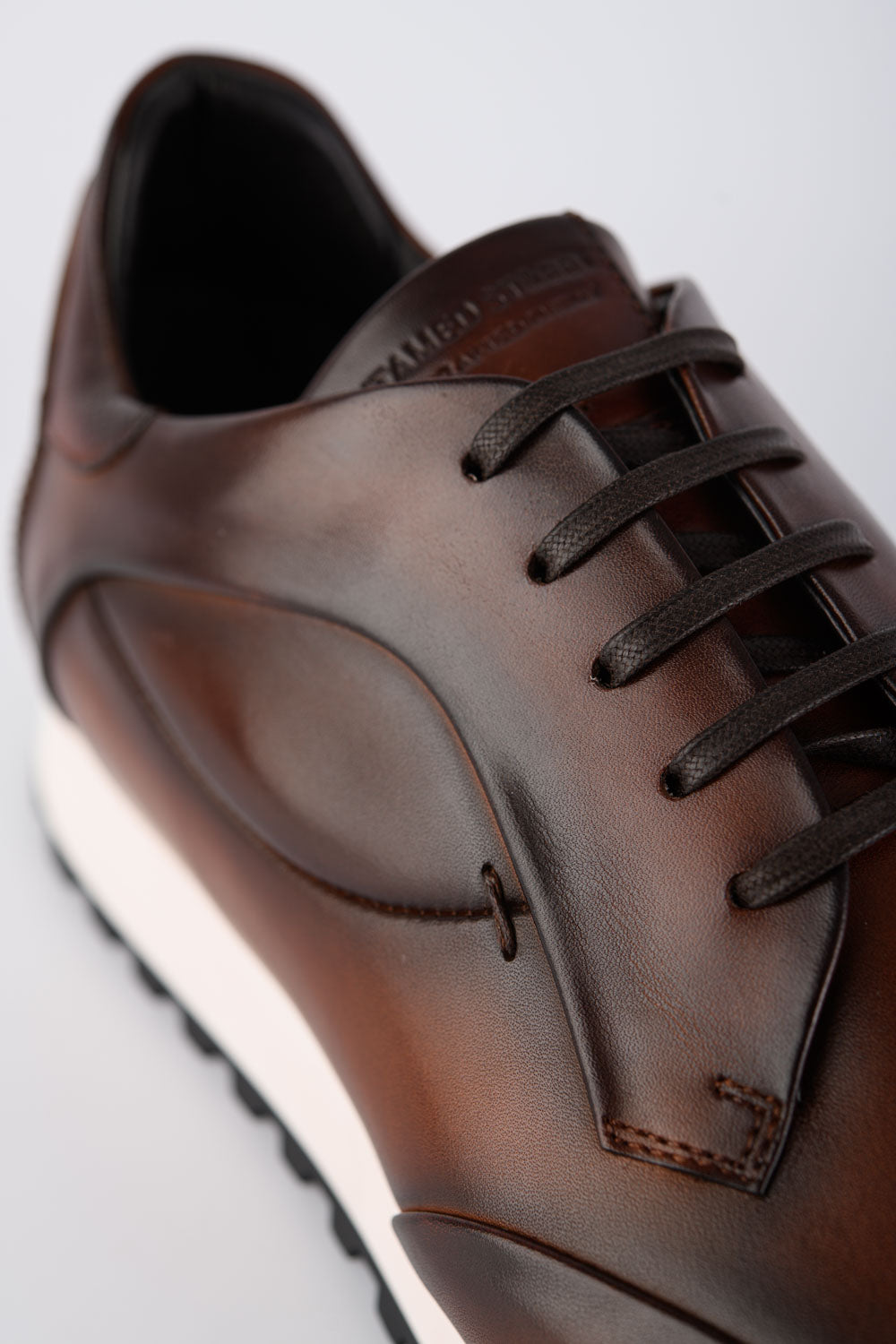 SOHO EDGE cocoa-brown patina runners.