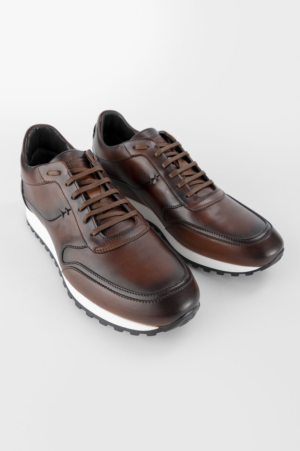 SOHO cocoa-brown patina runners.