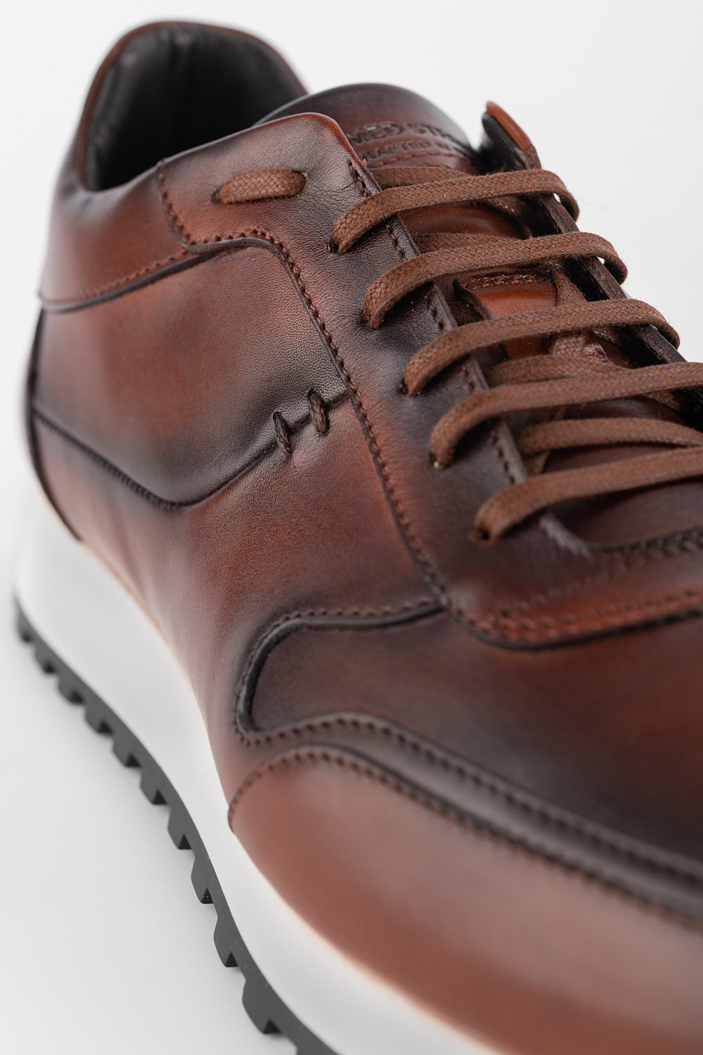 SOHO cocoa-brown patina runners.