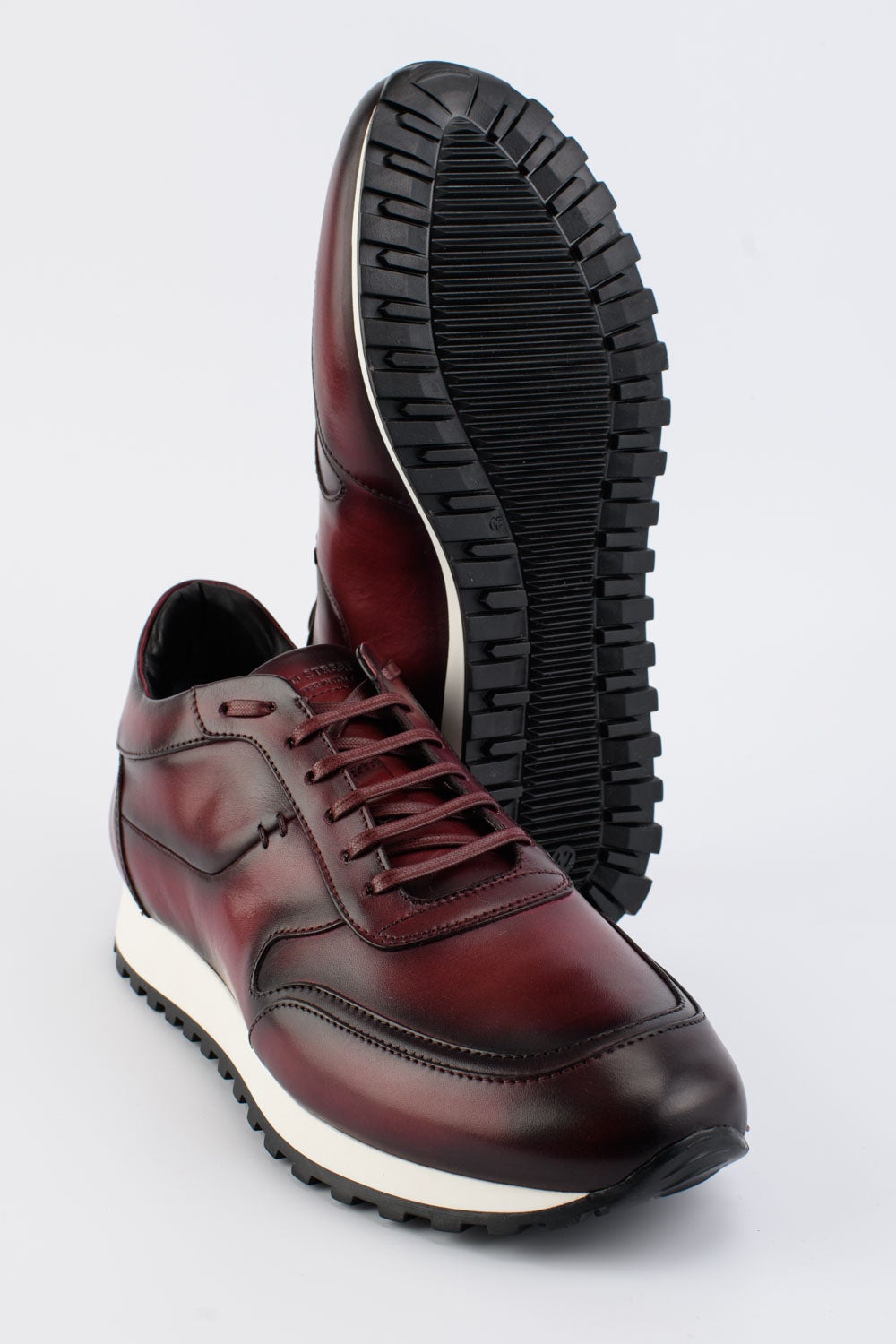 SOHO red-dusk patina runners.