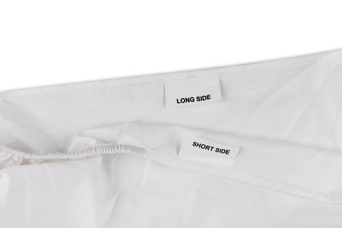 Labels LONG SIDE and SHORT SIDE sewn to the middle of 2 sides