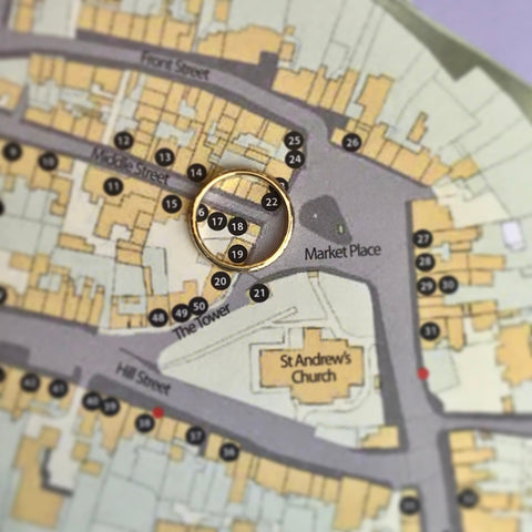 map of Corbridge Northumberland with a gold wedding ring placed over the shop of Kirsty Taylor Jewellery