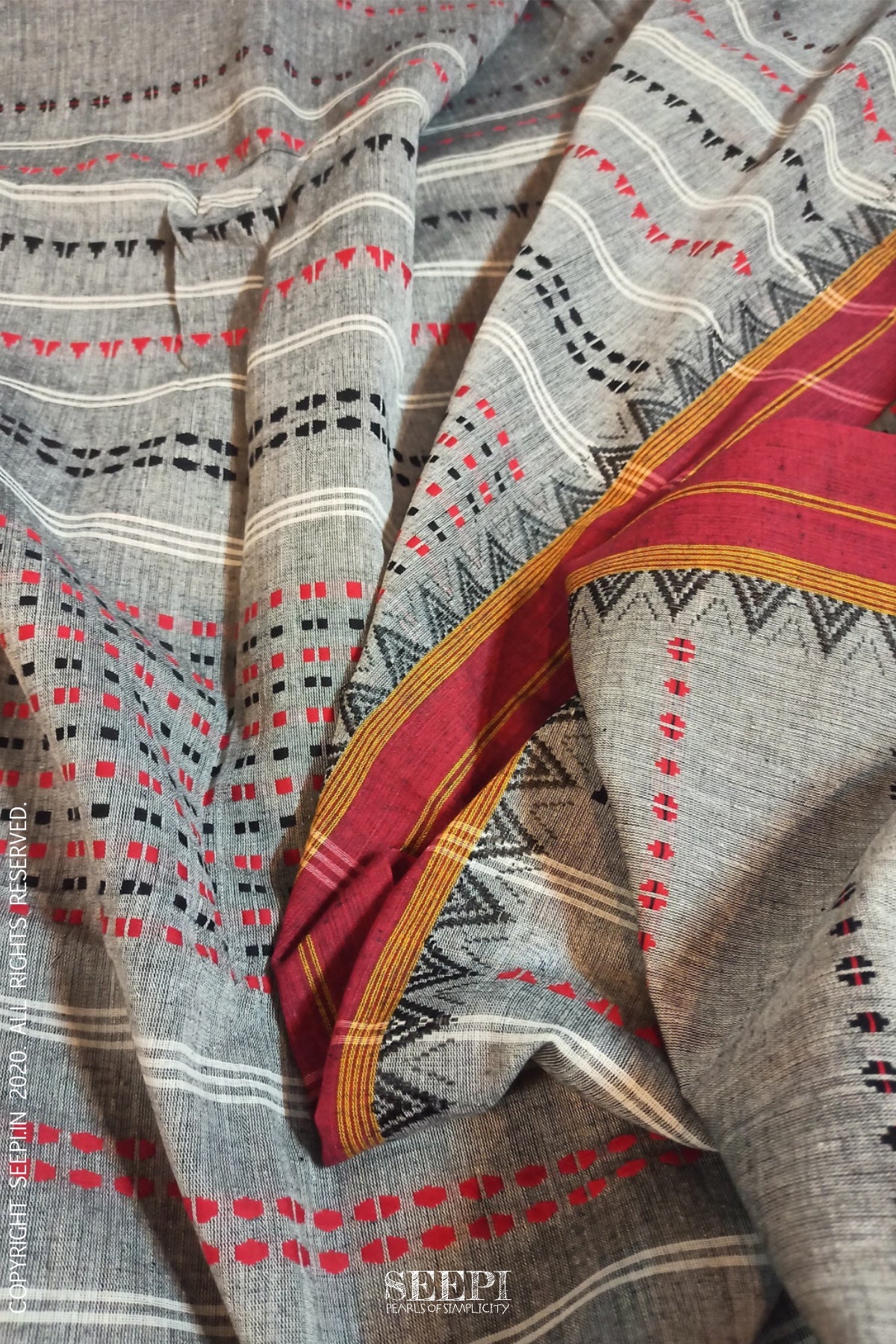 Uneven texture of a handloom saree